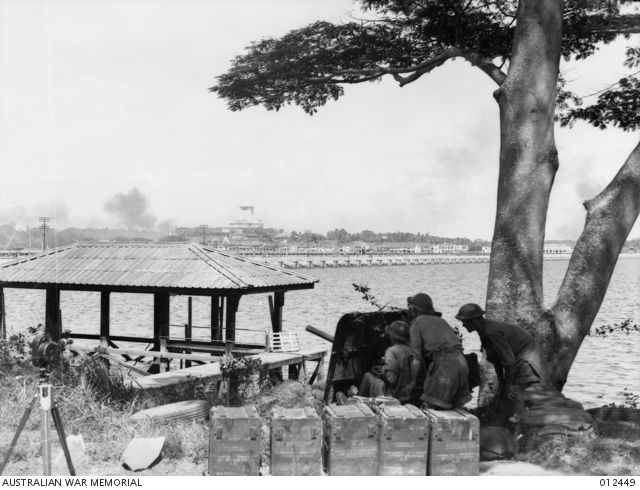 AIF gunners with a two pounder anti-tank gun overlooking the Johor causeway