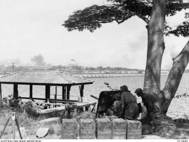AIF gunners with a two pounder anti-tank gun overlooking the Johor causeway