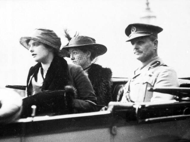 General Sir William Riddell Birdwood with his wife Jeanette and daughter Nancy driving through the city before an Anzac Day march.